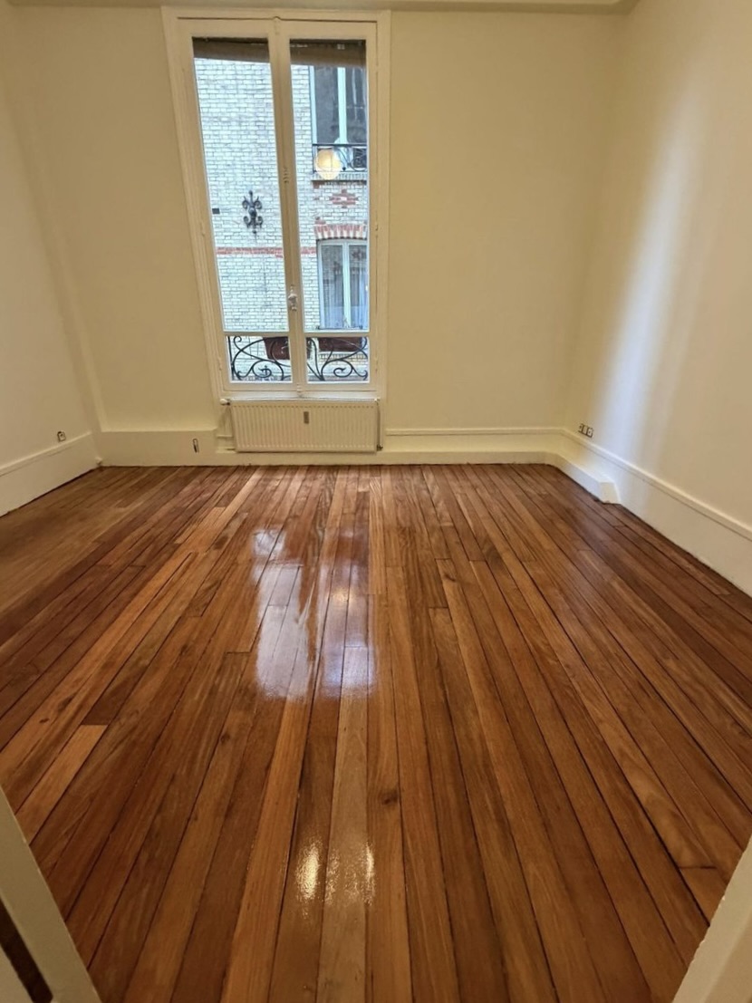 Duplex rénové — peinture et parquet